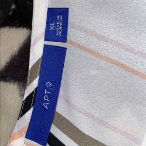 White with multicolored stripes dress shirt.